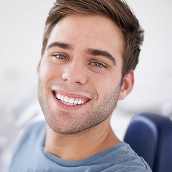 man smiling close to camera