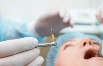 A woman at a dental implant consultation