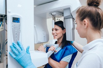 a patient receiving a cone beam CT scan