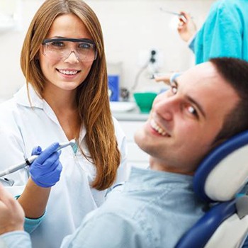 Smiling man in dental chair