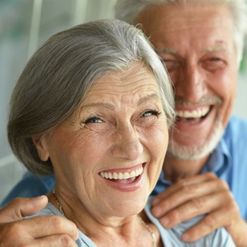 An older couple smiling