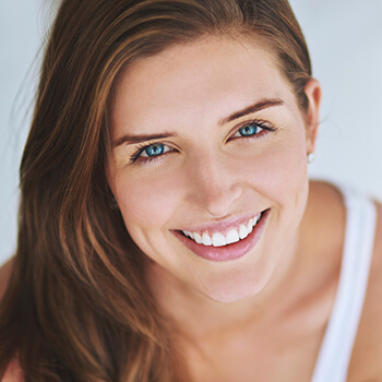 woman with blue eyes smiling