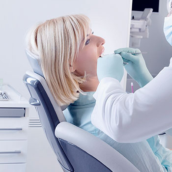 woman getting fluoride treatment