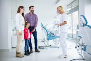 family visiting dentist together in crown point