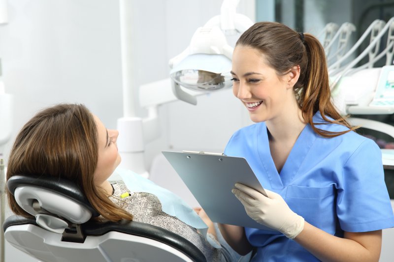 dentist helping patient about to travel for holidays 