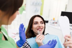 Woman choosing veneer color